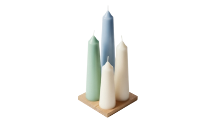 Isolated four assorted taper candles on wooden board for meditation, home decor, relaxation