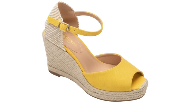 Isolated yellow canvas peep toe ankle strap espadrille wedge sandal fashion footwear object