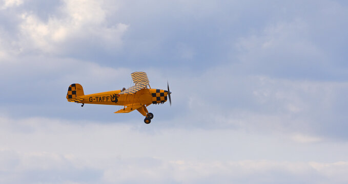Little Gransden, Cambridgeshire, England - August 24, 2025: Classic Yellow CASA 1.131E Jungmann
