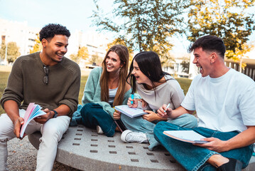 Diverse students laughing enjoying campus life outdoor