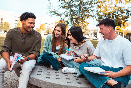 Diverse students laughing enjoying campus life outdoor