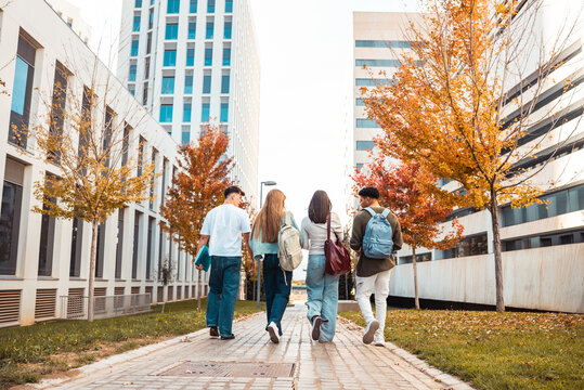 University students walking on campus during autumn