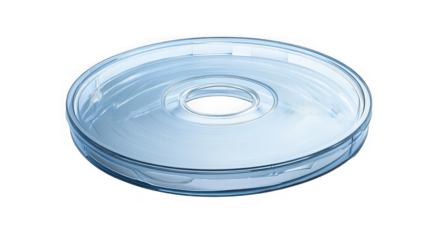 Clear sterile plastic petri dish with vented lid resting isolated on a stark black background representing laboratory research equipment for biology.