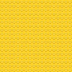 Seamless yellow plastic circular button pattern background with glossy surface and symmetrical dot layout for cheerful toy texture and bright design concepts