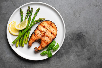 Grilled salmon steak with asparagus