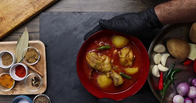 Bengali style spicy chicken curry stew with potato leg piece recipe ingredients tomato ginger gallic onion cumin coriander garam masala salt turmeric chili