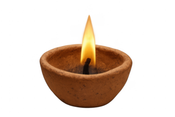 Diya clay oil lamp burning with a flame celebrating diwali