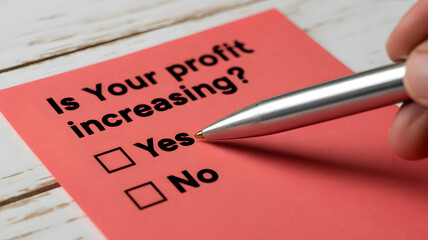 "Is your profit increasing?" Question on White Paper with Check Boxes Business Concept