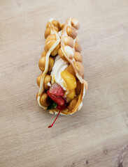 Tasty bubble waffle with cream