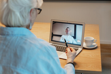 Person Participating in Video Call Meeting