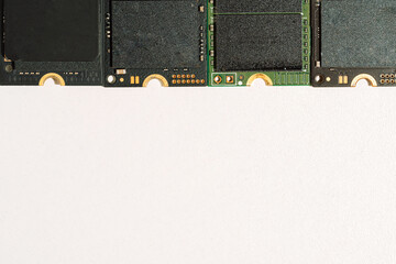 M.2 NVMe SSD modules top border on white background with copy space. High quality photo