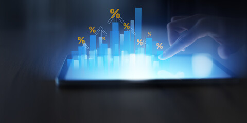 Financial Growth and Rising Interest Rates Visualization on Digital Tablet.