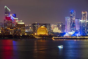 Obraz premium Night view of the modern architectural city skyline in Binjiang CBD, Hangzhou, China
