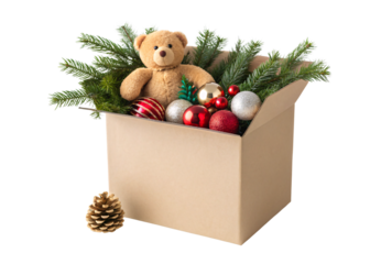 Cardboard box filled with teddy bear Christmas ornaments pinecone and evergreen branches, isolated on a transparent background
