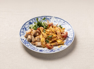 Grilled Chicken with French Fries and Salad on Blue Plate