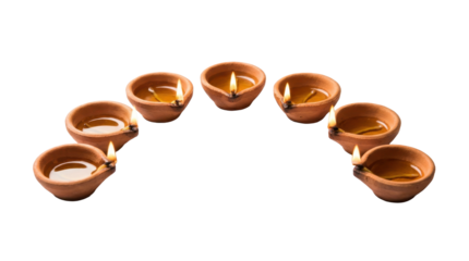 Pongal festival arrangement of seven small brown earthen pots in a semi circle arc on a white background for a png with transparency