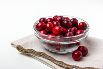 Fresh cranberries on linen napkin