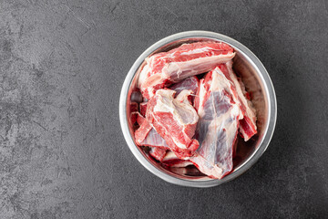 Raw beef ribs in bowl