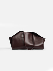 Woman leather bag on a white background