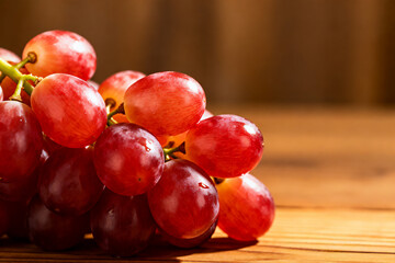 Fresh ripe grapes with a natural glossy texture, isolated on a pure white background and captured in clean studio lighting.