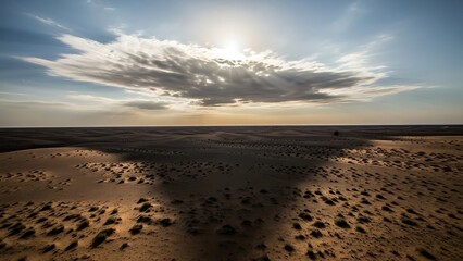 Desert Landscape with Clouds at Sunset