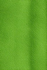Vibrant green leather texture background with fine grain, eco friendly artificial skin surface, premium synthetic leather cloth