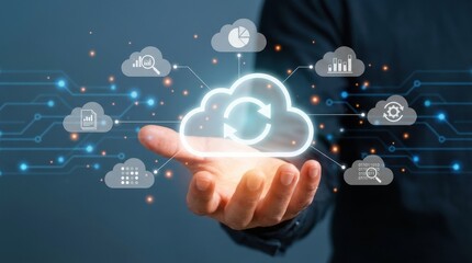 Hand presents a glowing cloud icon surrounded by smaller clouds and dots suggesting data transfer or network connectivity