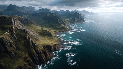 Aerial view of rugged coastline and majestic mountains