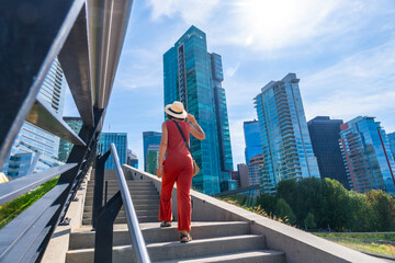 Tourist walking up stairs in vancouver city center