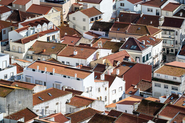 Portuguese red roofs in the city. Colorful houses in Portugal