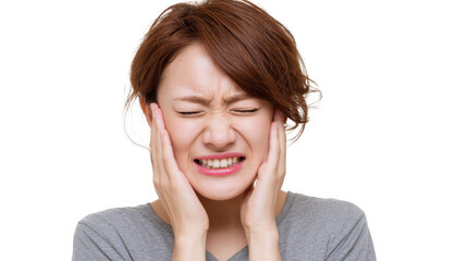 Fototapeta premium Bearded man in casual clothing gripping his neck and displaying a painful grimace while experiencing discomfort from neck pain on a transparent background