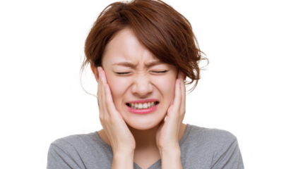 Bearded man in casual clothing gripping his neck and displaying a painful grimace while experiencing discomfort from neck pain on a transparent background