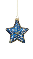 Shiny royal blue star Christmas tree ornament with gold glitter borders and elegant white ornate scroll patterns isolated.
