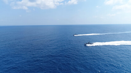 Naklejka premium Israeli Navy Saar Missile BoatIsraeli Navy Saar class missile boat sailing at high speed across open sea, Israel, November 2025. 