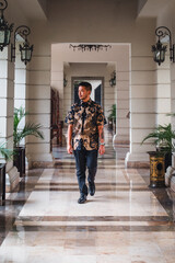 man in indonesian batik shirt