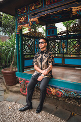 man in indonesian batik shirt