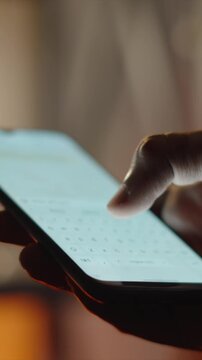 Person Using WhatsApp on Smartphone &ndash; Online Chatting Concept Vertical