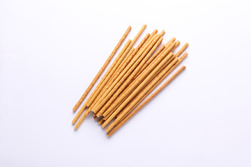 Cracker sticks on white background close up