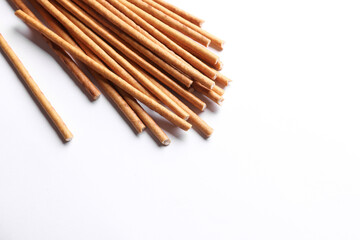 Obraz premium Cracker sticks on white background close up