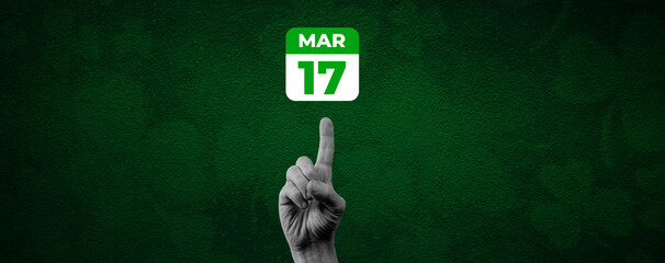 St. Patrick Day calendar, March 17. Halftone collage: a hand pointing to a calendar with the date March 17.