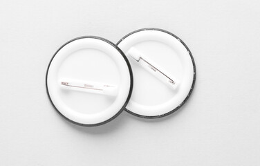 Round pin button badges on white background