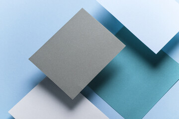 Set of colored floating blank card sheets with shadow on blue background. Minimalism business brand template, creative layout