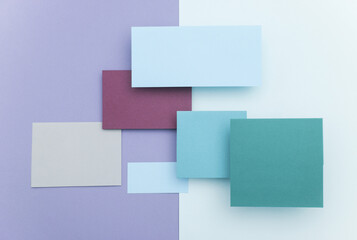 Fototapeta premium Group of floating colored blank cards sheet with shadow on pastel background. Minimalism business brand template, creative layout