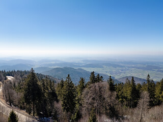 Black Forest with a view from the Blauen mountain near Schliengen in spring, drone photo