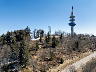 Black Forest with a view from the Blauen mountain and the radio tower near Schliengen in spring, drone photo