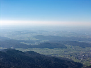 Black Forest with a view from the Blauen mountain near Schliengen in spring, drone photo