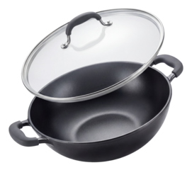 A deep frying wok with a lid, ideal for cooking Asian dishes at home.