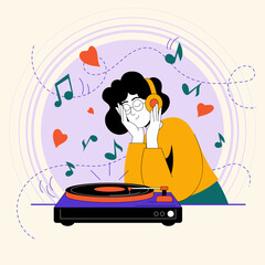 Listening to a vinyl record on a turntable while enjoying music in a cozy space