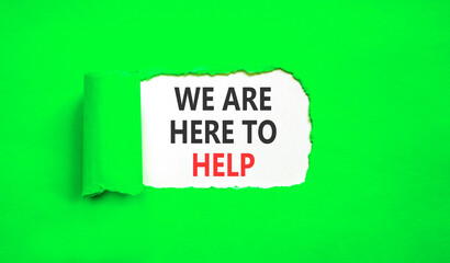 Support, help and we are here to help symbol. Concept words We are here to help on beautiful white paper. Beautiful green paper background. Business we are here to help concept. Copy space.