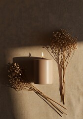 Lit candle and dried flowers aesthetic still life in warm tones